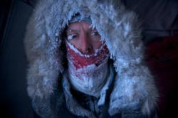 Polar explorer Adrian McCallum snow crusted after a day of trekking earlier in the expedition
